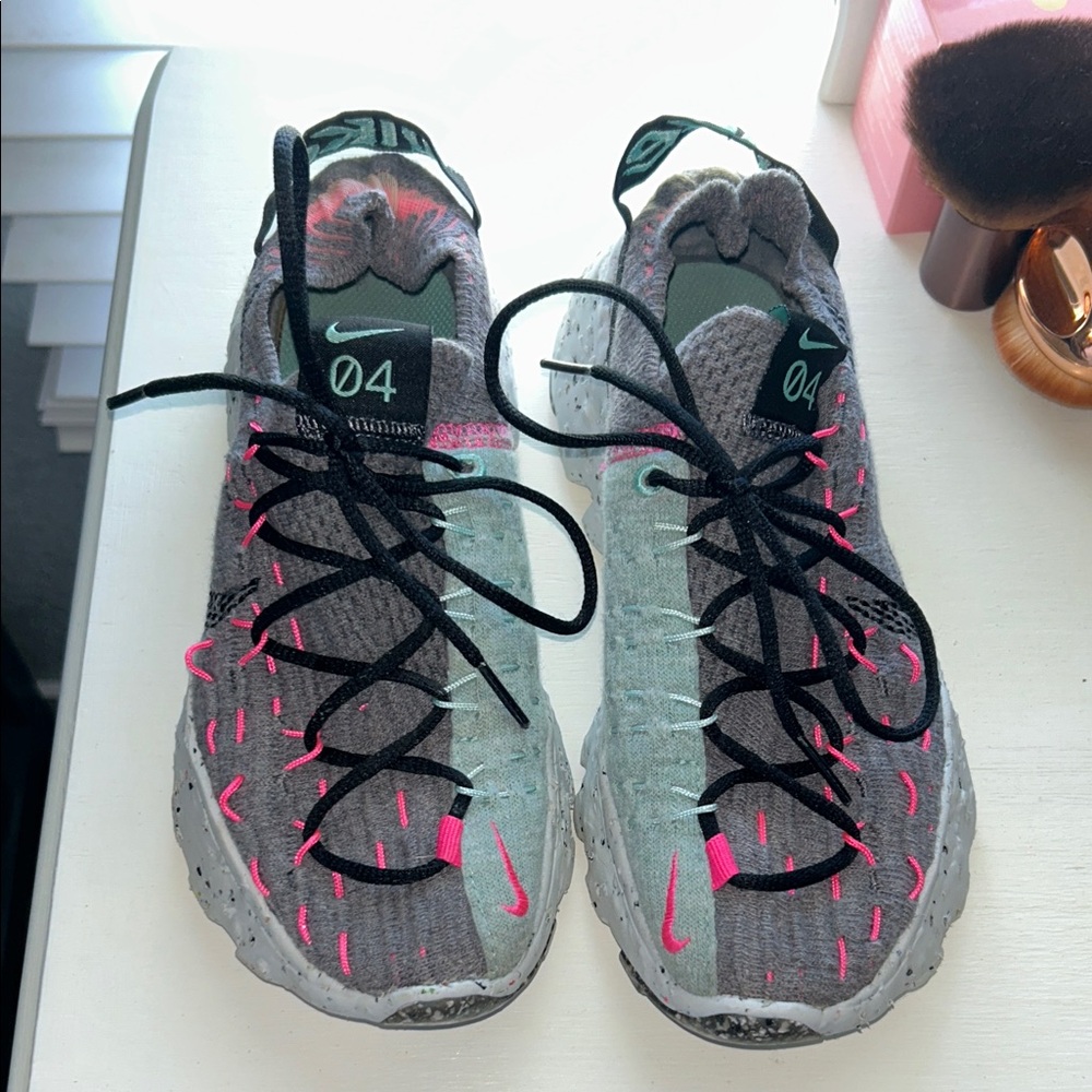 Nike Women’s Gray Sneakers with Pink Accents